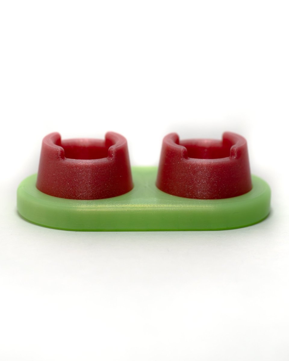 Ooze Doc with two cupid pink bubble cap holders. 