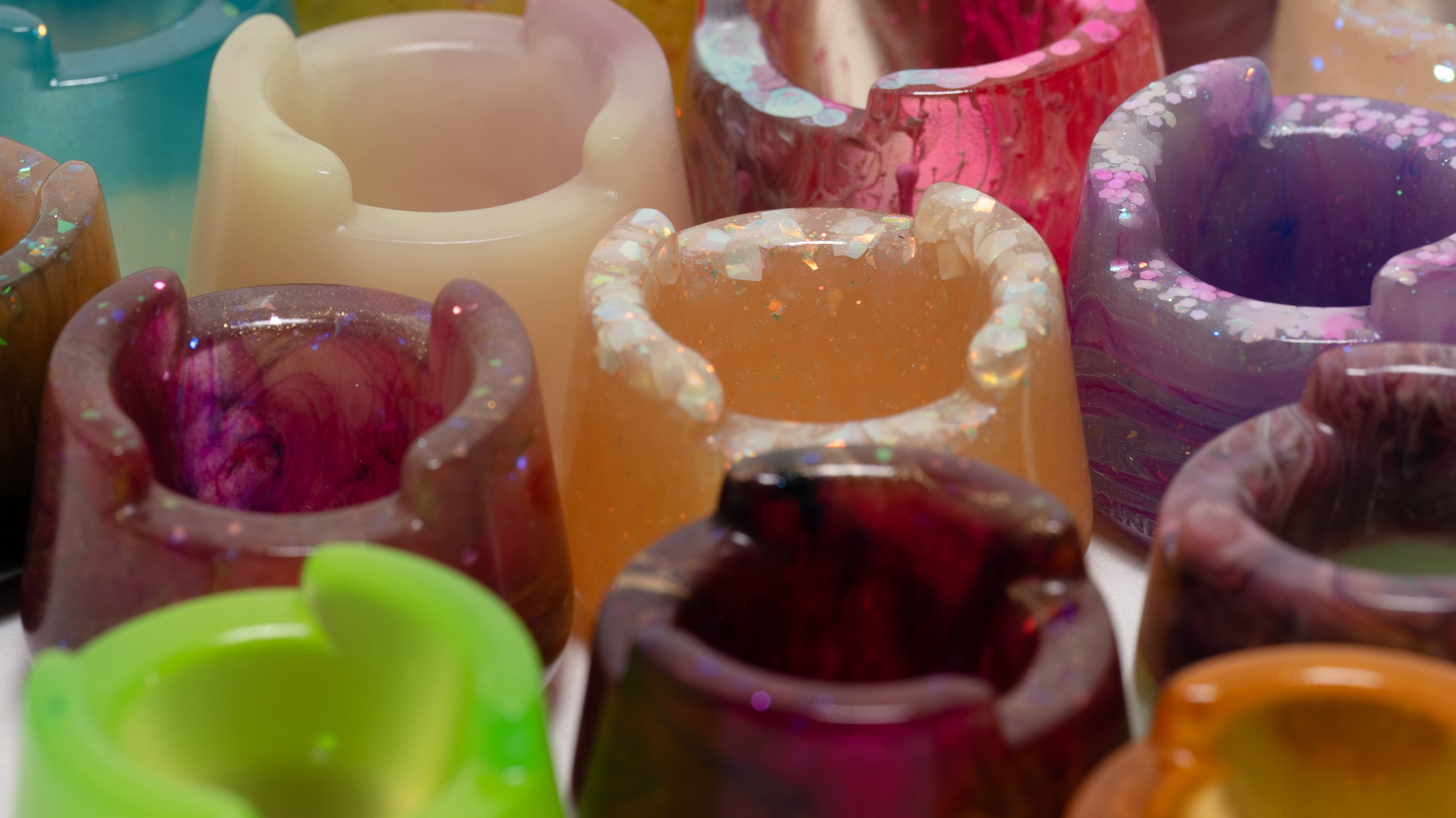 Assorted bubble cap holders in different colors.