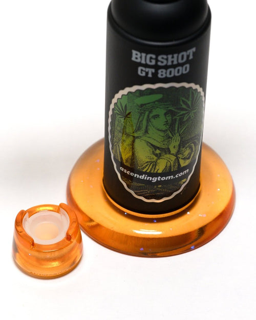 Close-up of Orange resin base on Blazer big shot gt 8000 and bubble cap holder.