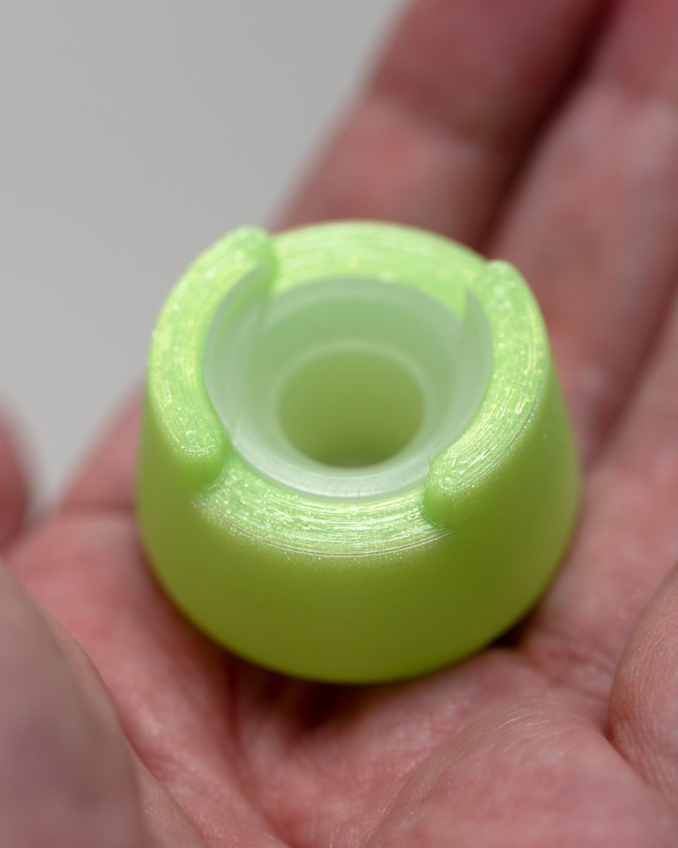 Top view of bubble cap holder lite with included silicone insert: color ooze green.