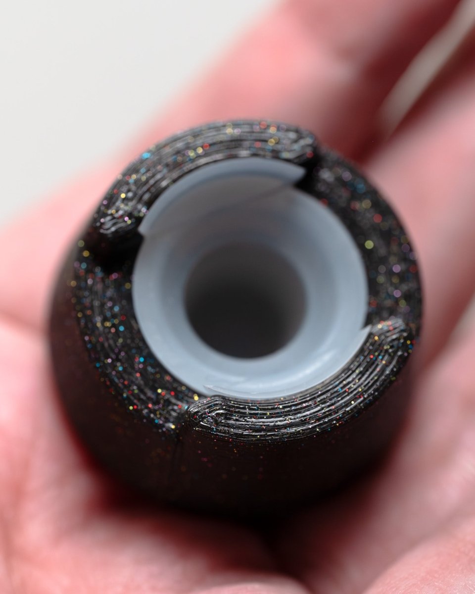 Top view of bubble cap holder lite with included silicone insert: color Galaxy Black.