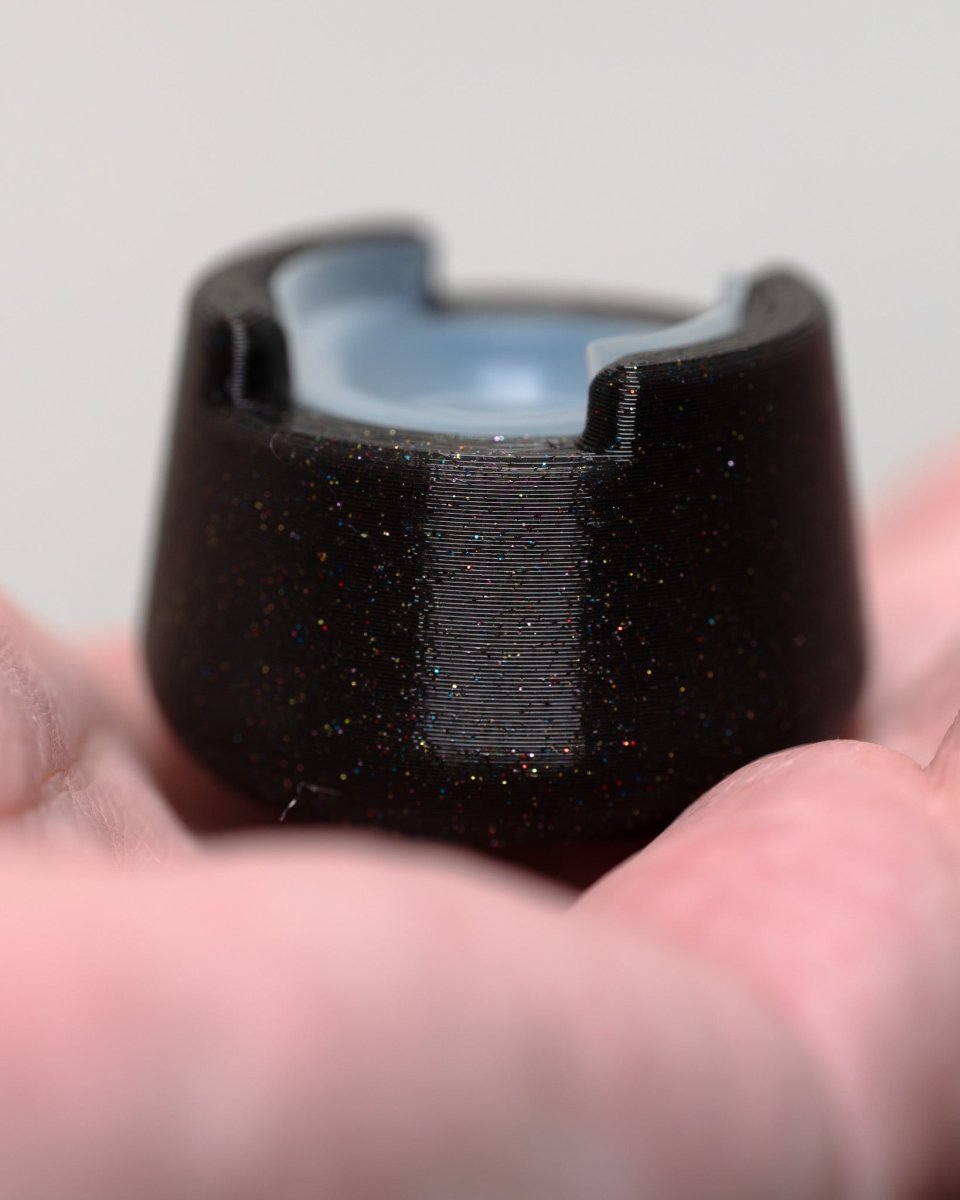 Front view of bubble cap holder lite with included silicone insert: color Galaxy Black.