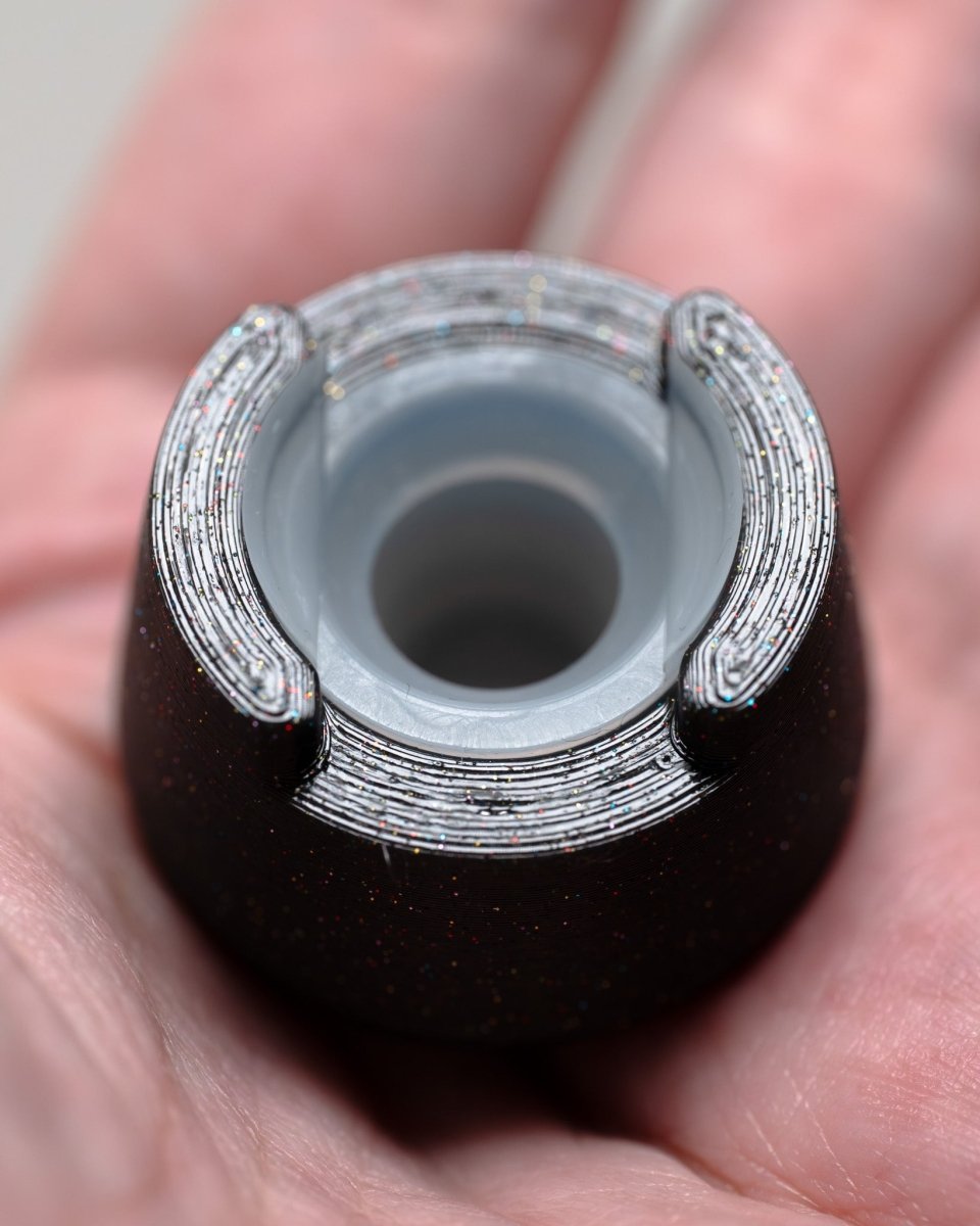 Top view of bubble cap holder lite with included silicone insert: color Galaxy Black.