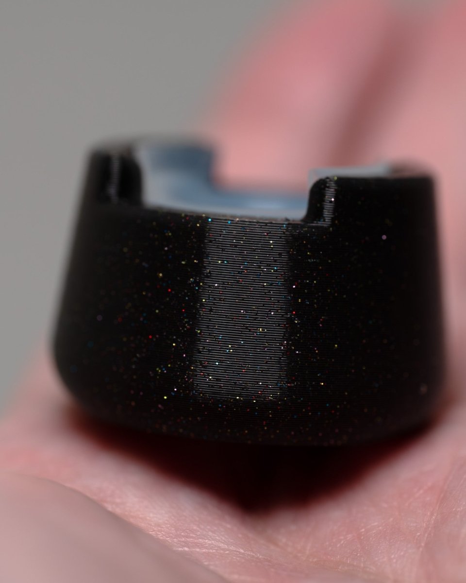 Front view of bubble cap holder lite with included silicone insert: color Galaxy Black.