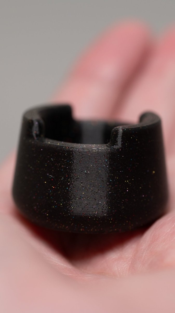 close up of ascendingtoms bubble cap lite holder : - galaxy black - great for carb caps, dab tools, and marbles