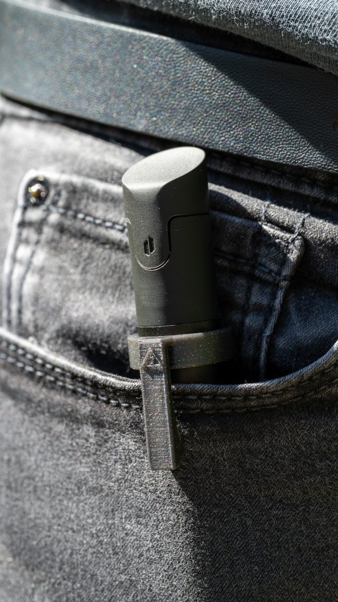 Galaxy black Puffco Pivot pocket clip in pocket.