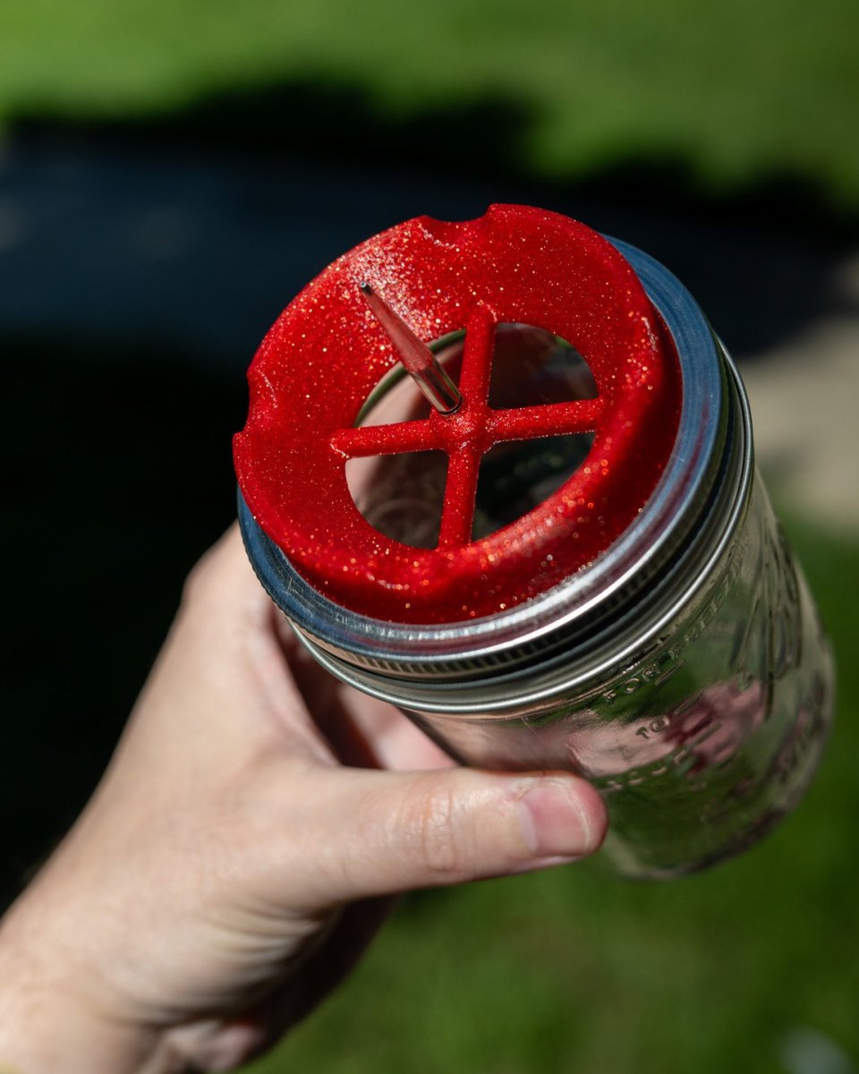 Mason jar ashtray with poke in fire red